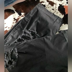 Black distressed denim flares plus size